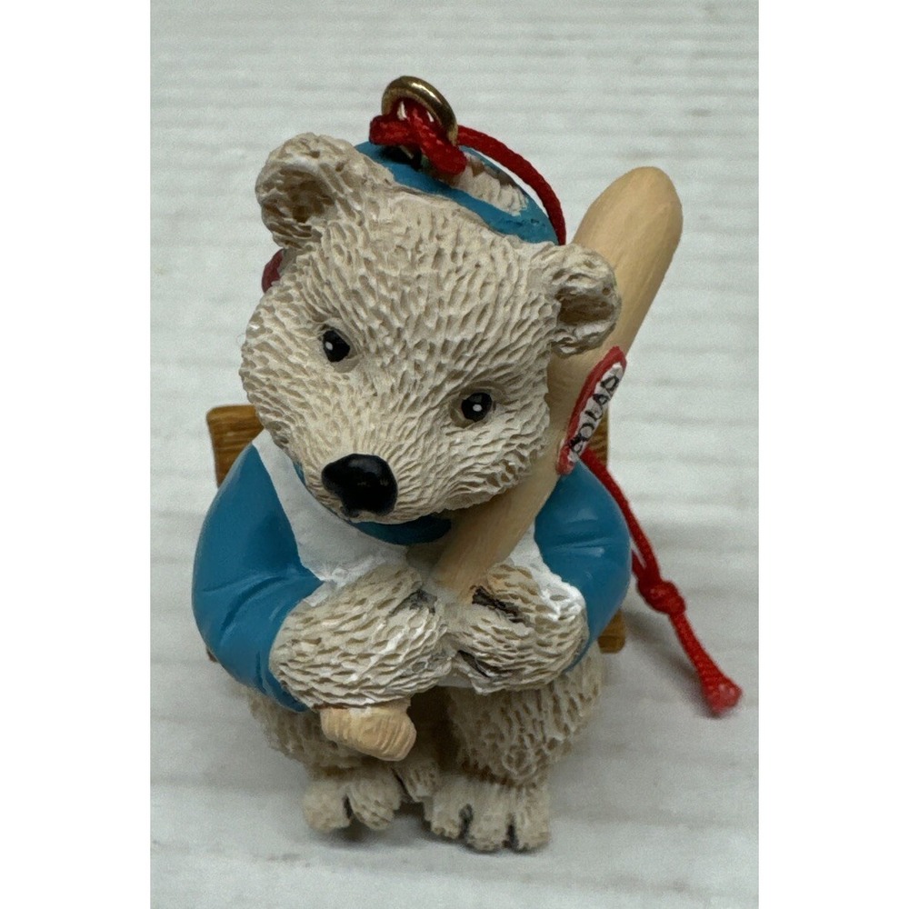 AVON 1998 Polar Bear Sports Ornament Baseball 2.5" bat sitting on chair